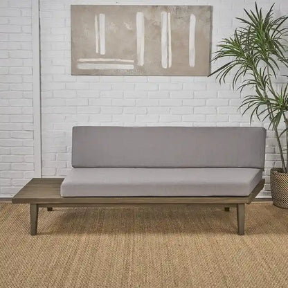 Canapé simple en bois et en tissu sur la gauche