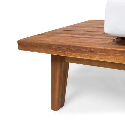 Canapé simple en bois et en tissu sur la gauche
